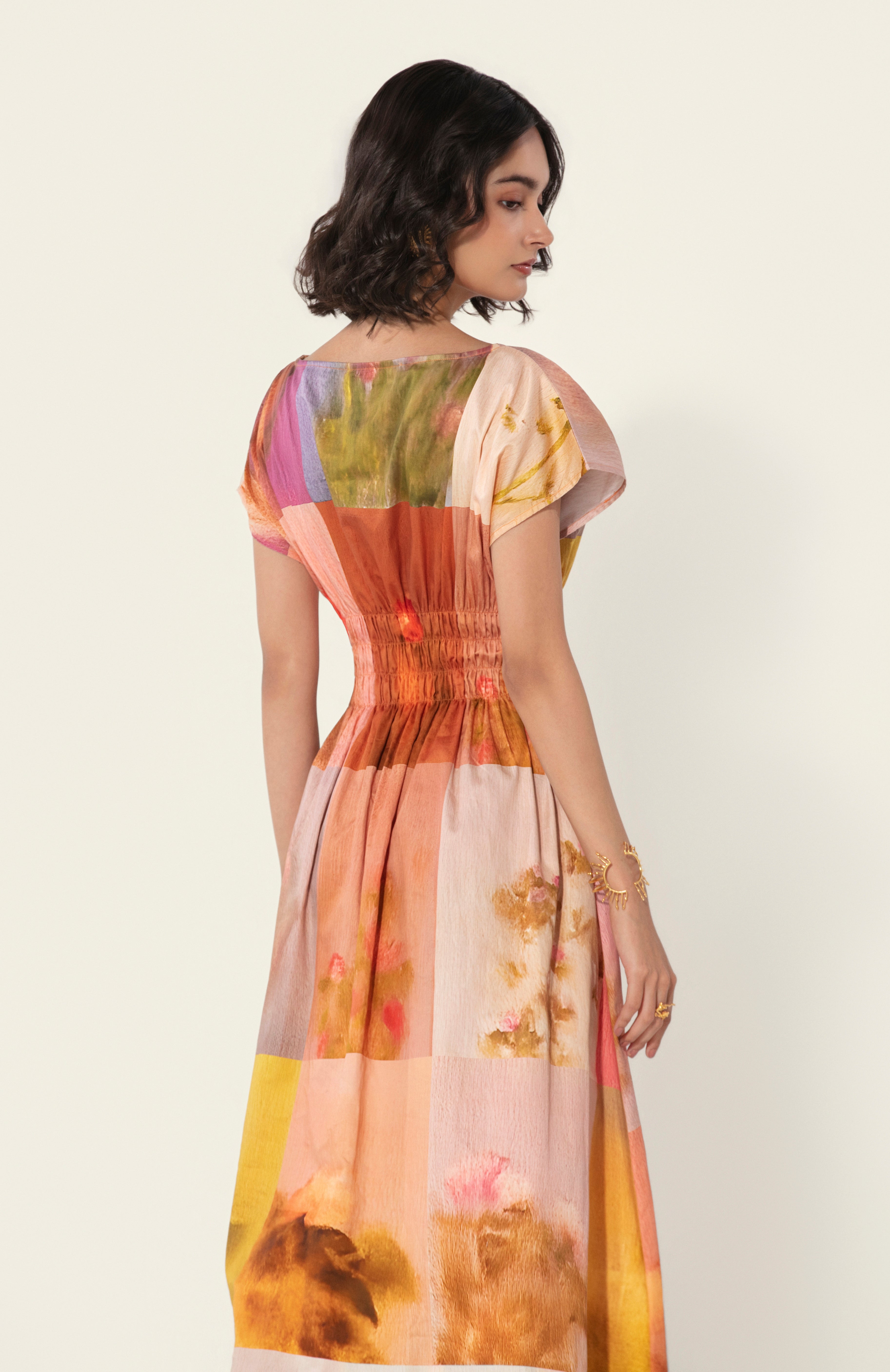 Bunila in Amelia Smocked Midi Dress
