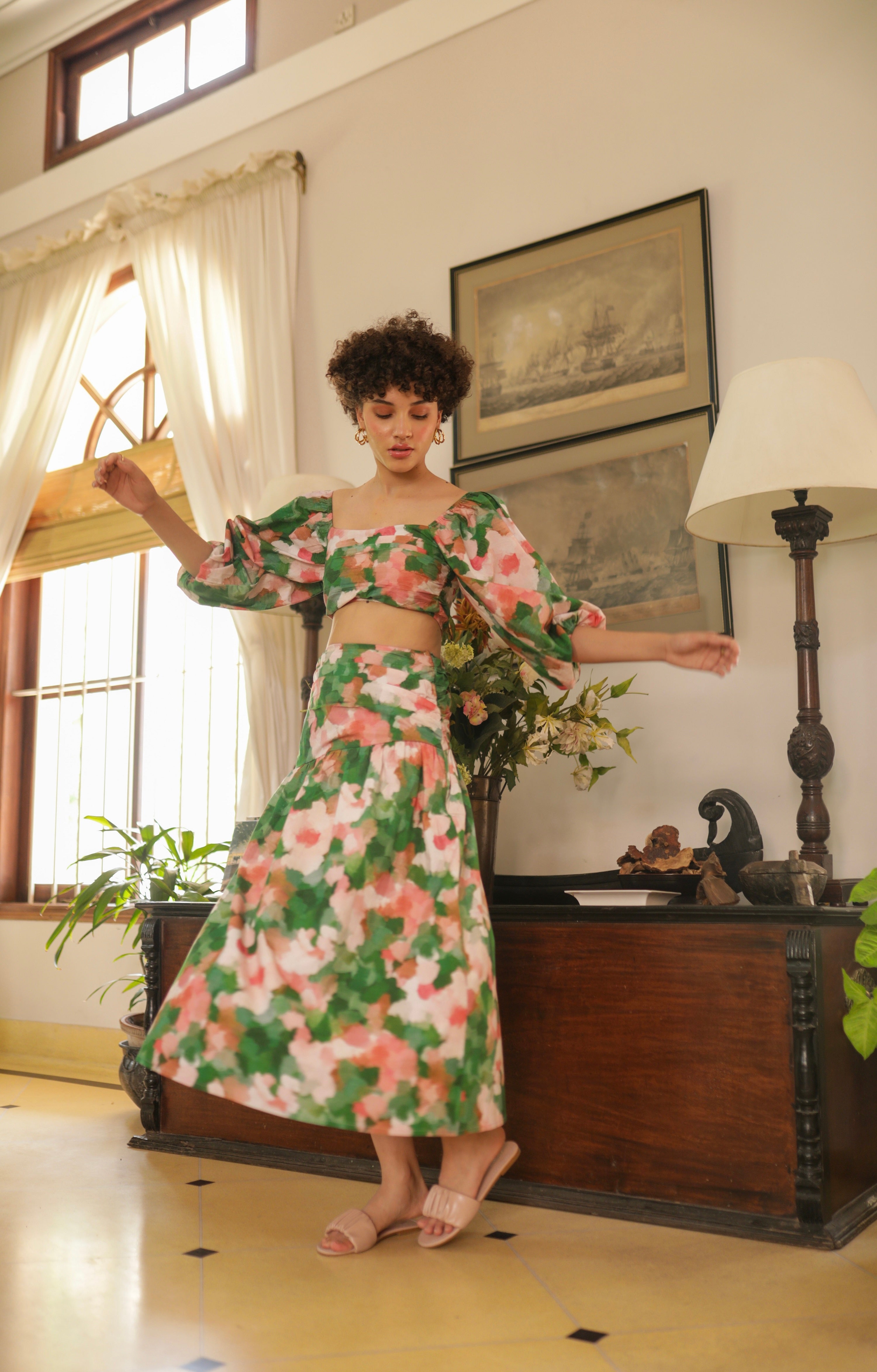 thr3letter's signature Marilyn skirt set with romantic blooms and coordinated crop top design