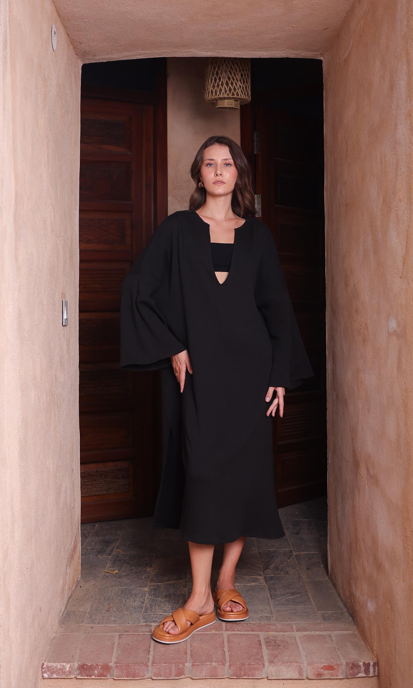 Thr3letter's Kiaan Kaftan in a rich, regal black hue, crafted from a seersucker and cotton blend.