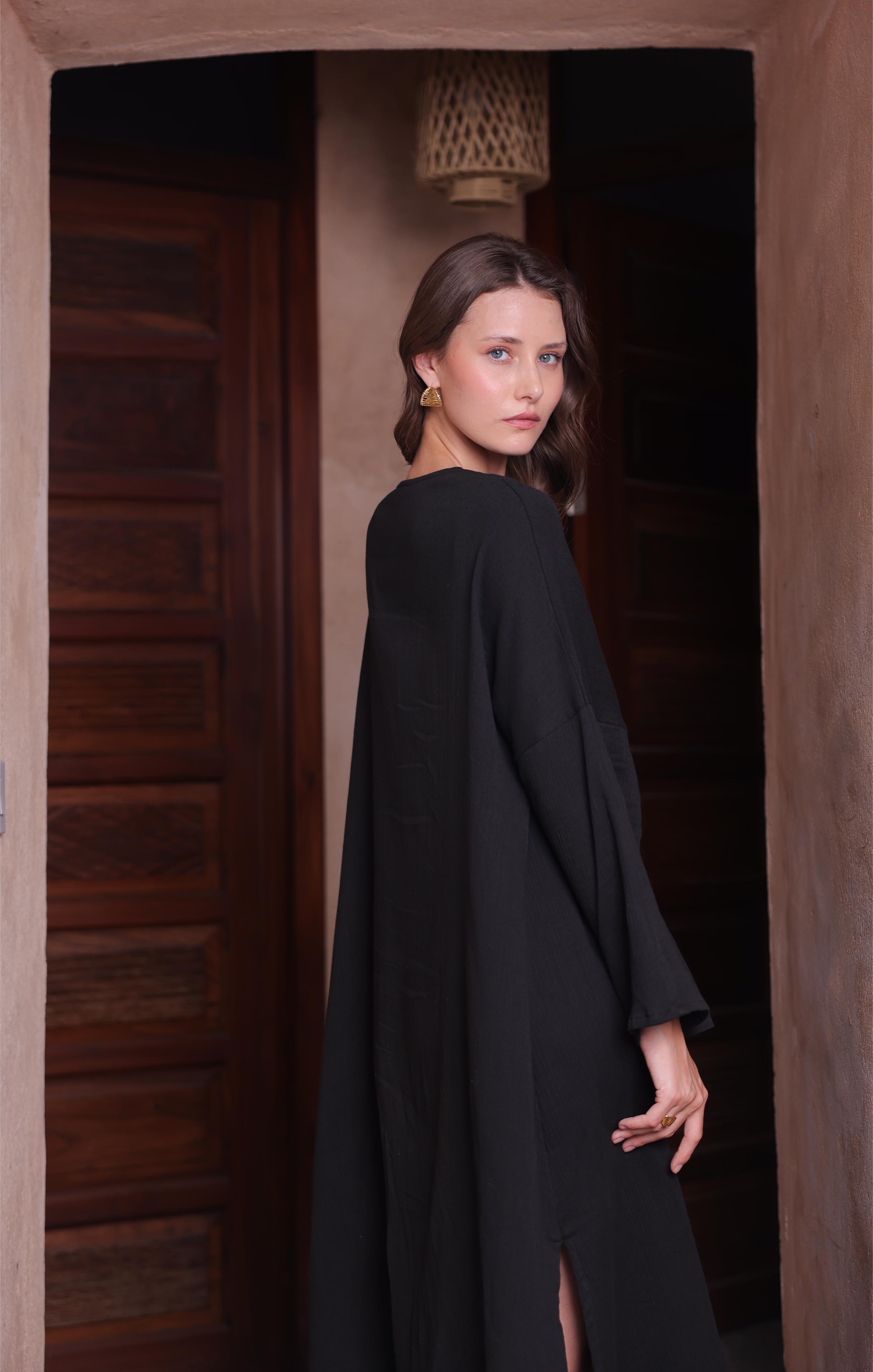 Thr3letter's Kiaan Kaftan in a regal black tone, perfect for effortless style and comfort.