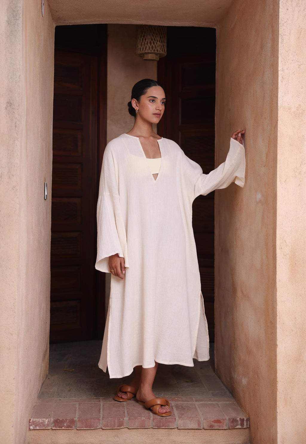 The Kiaan Kaftan from Thr3letter, an almond-colored style that exudes a natural, earthy aesthetic.