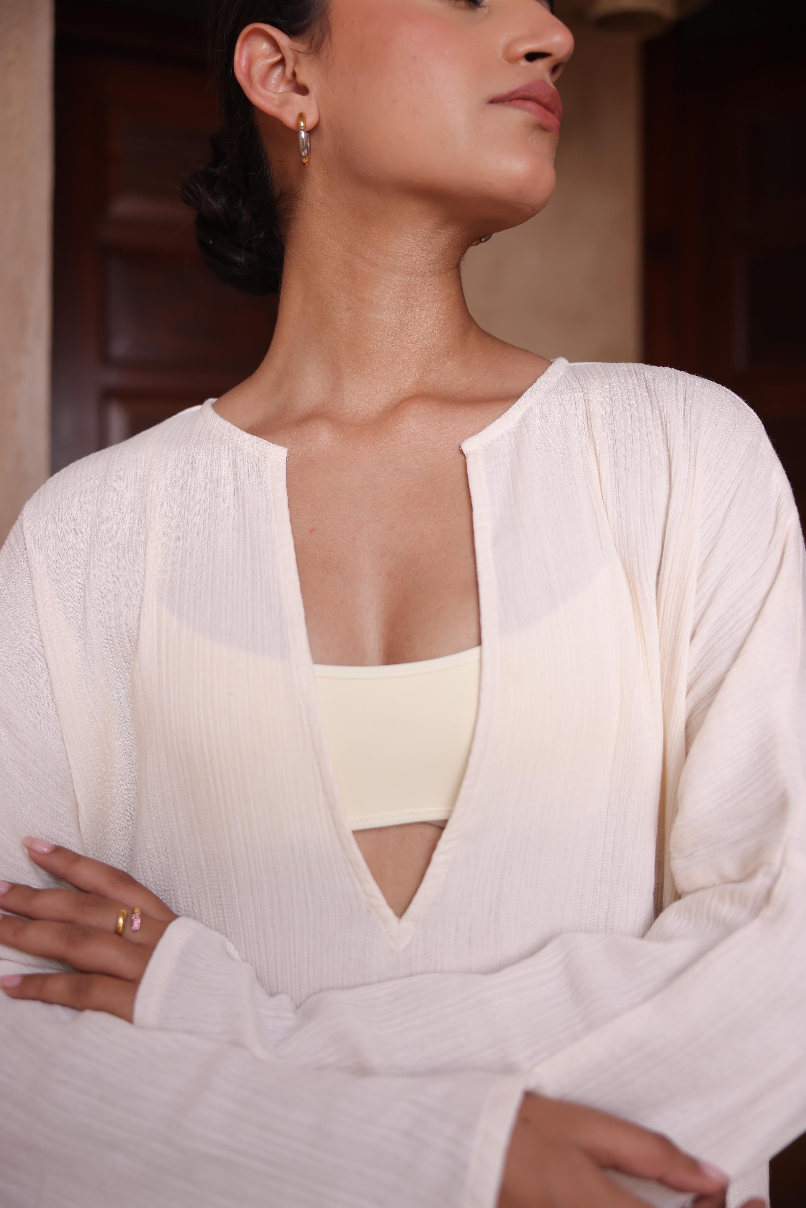 The Kiaan Kaftan by Thr3letter, a seersucker and organic cotton blend in a beautiful almond hue.