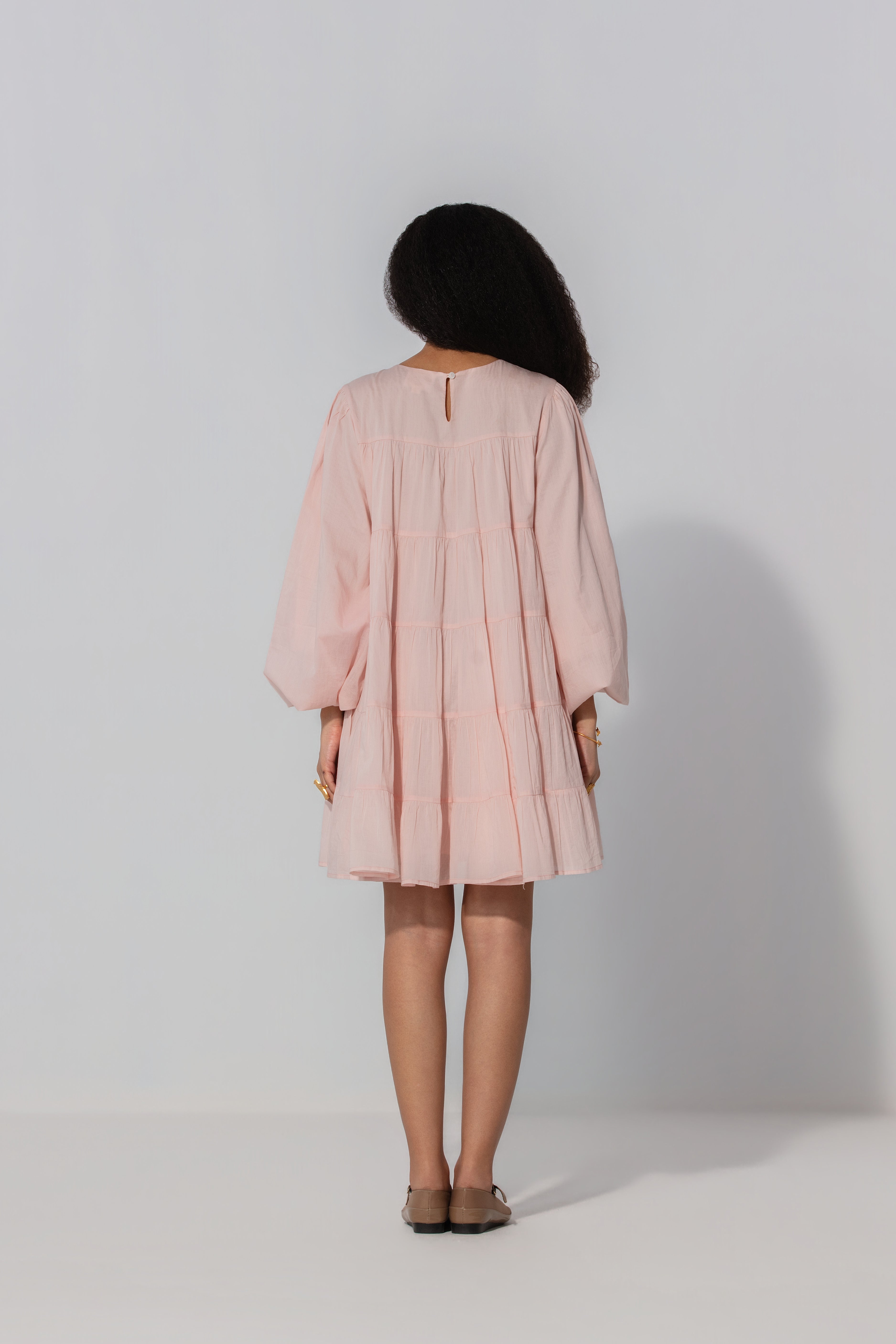 Vibha in blush Tiered Cotton Mini Dress