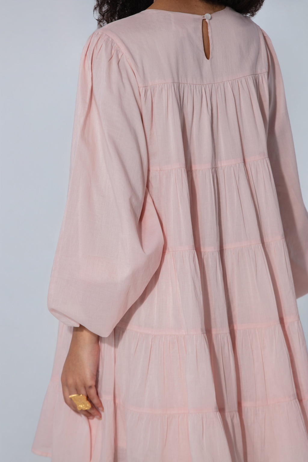 Vibha in blush Tiered Cotton Mini Dress