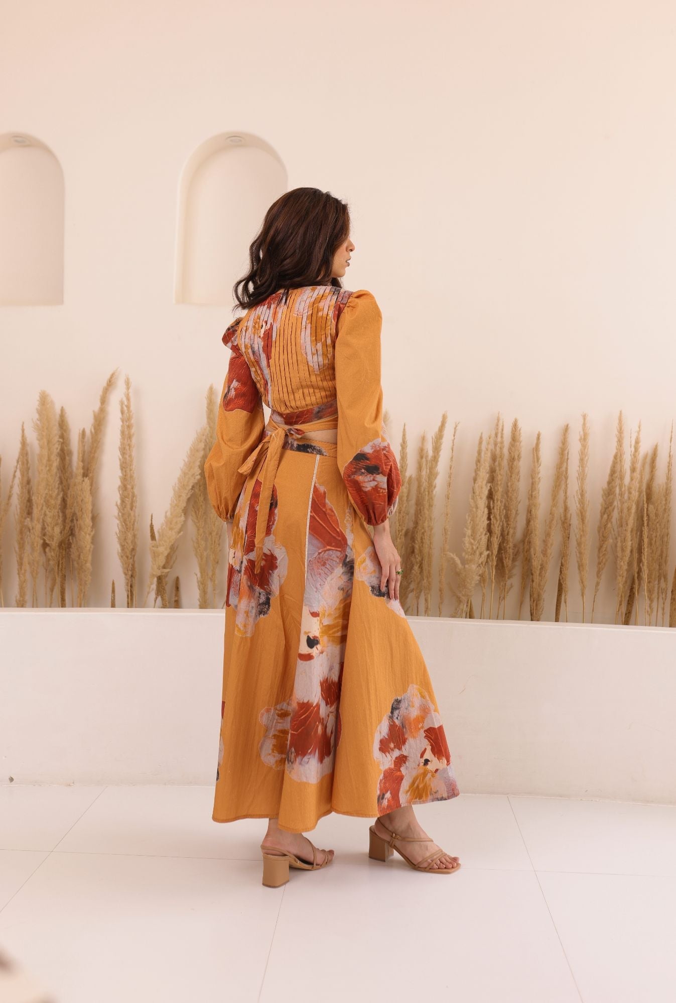 Designer maxi dress featuring unique color splashes in orange and forest green by Thr3letter