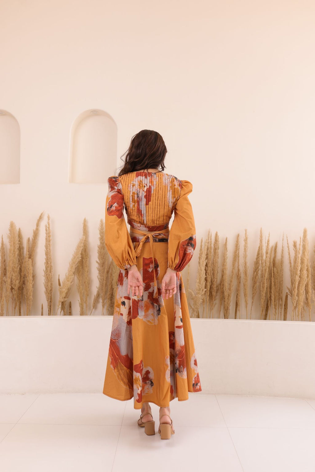 Thr3letter bohemian cotton dress featuring earthy tones and feminine silhouette