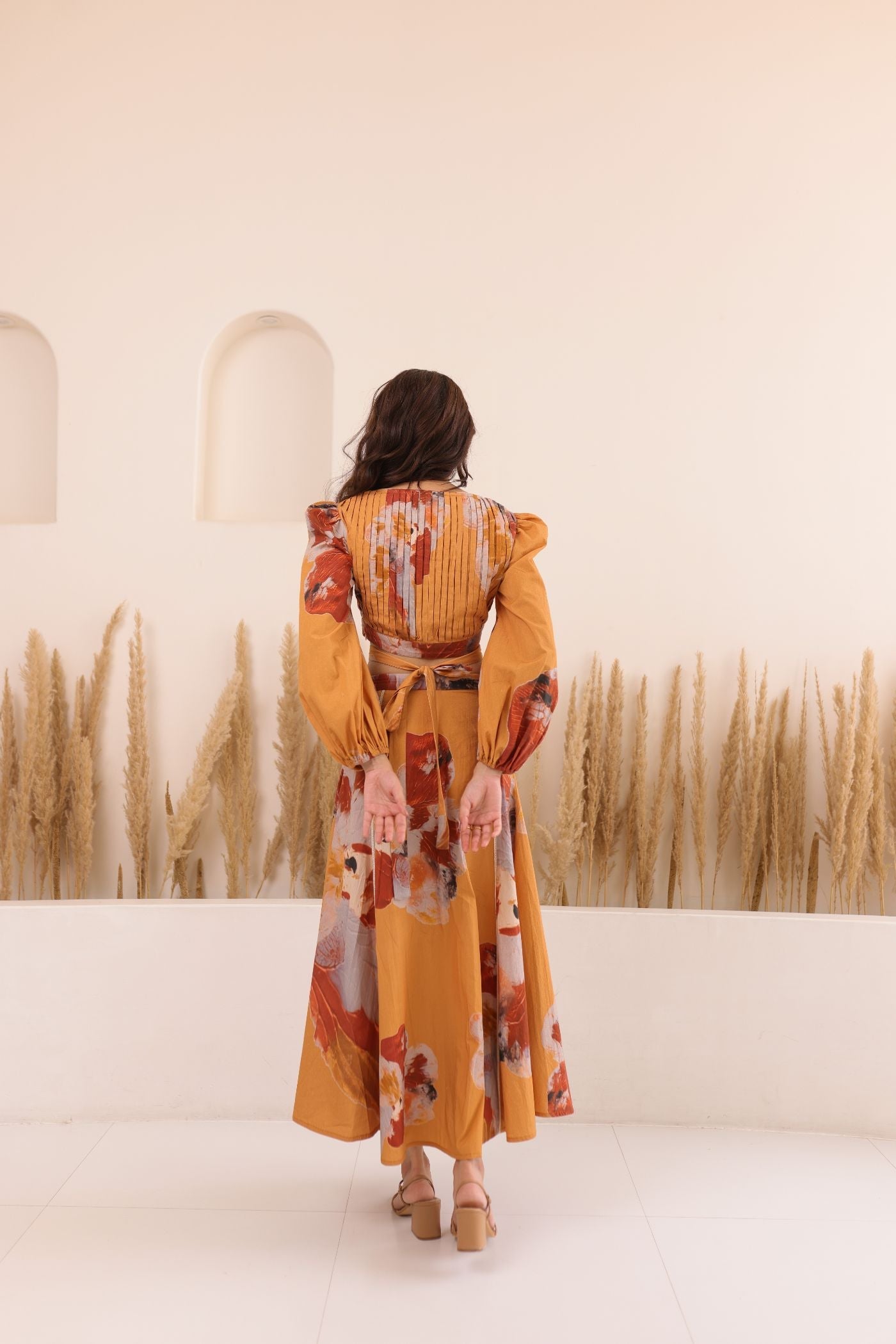 Thr3letter bohemian cotton dress featuring earthy tones and feminine silhouette