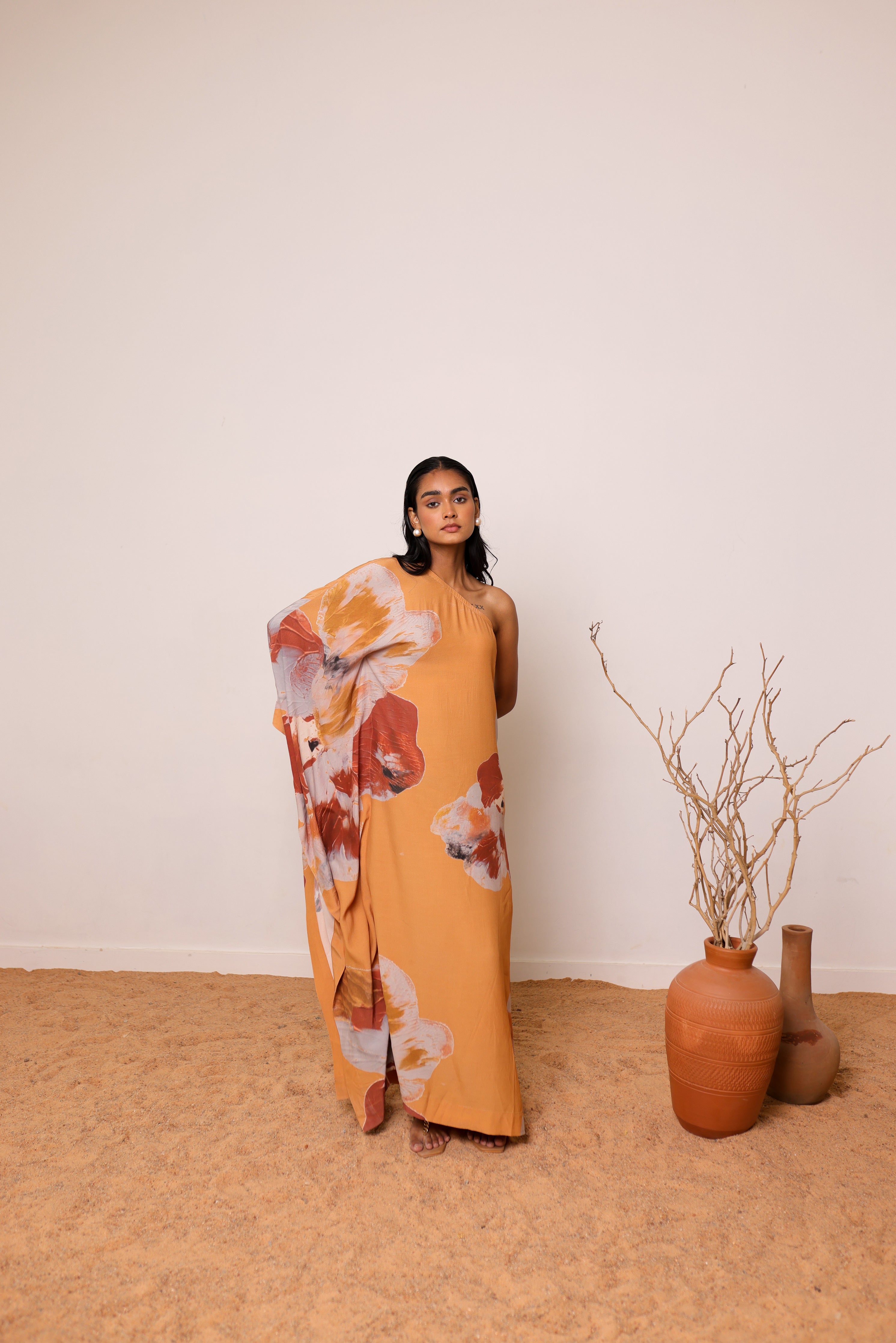 Elegant Thr3letter Lumiere Kaftan: Breathable silk-crep construction offering ultimate comfort with refined, sculptural aesthetic.